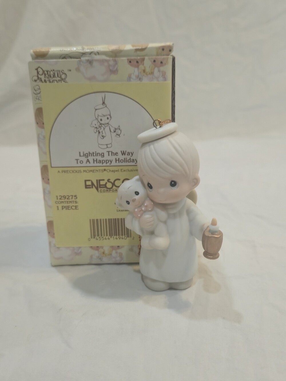Enesco Precious Moments angel ornament in white with cream and pink accents